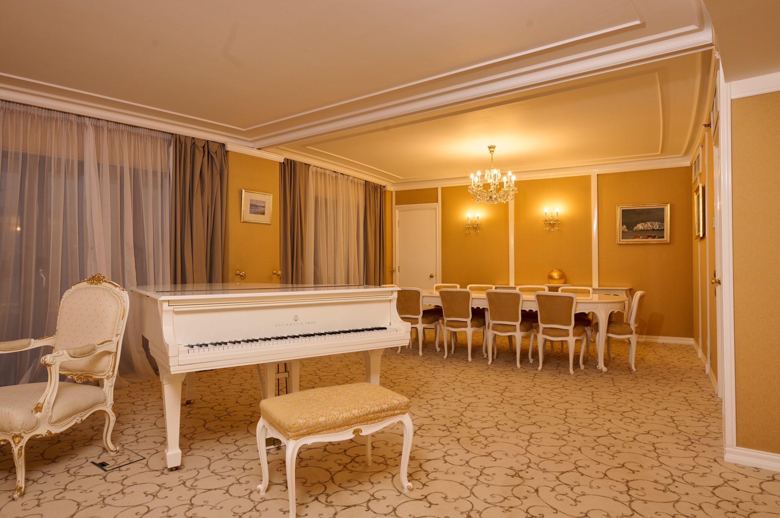 Imperial Apartment dining room with white piano